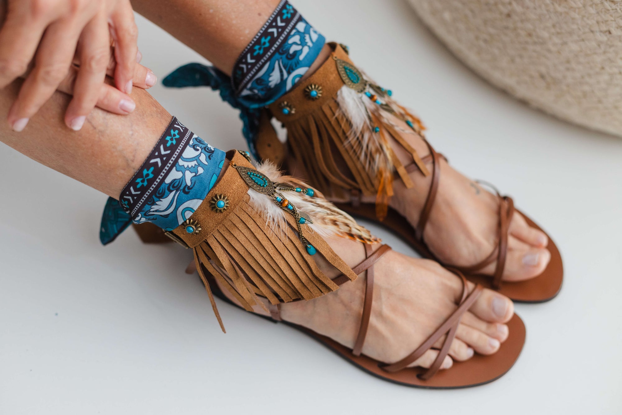 Fringed_camel_ankle_cuffs_with_turquoise_dreamcatcher_1