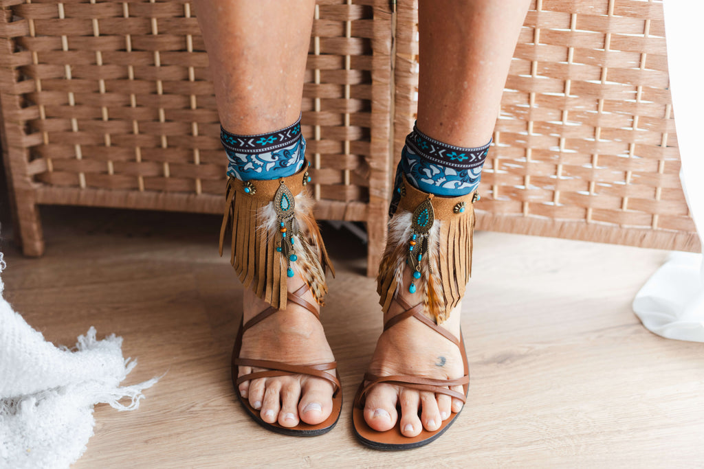 Fringed camel ankle cuffs with turquoise dreamcatcher
